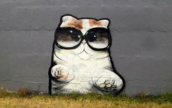 Graffiti Kitten With Big Glasses Sprayed On Wall Stencil Cats