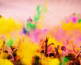 People Playing Holi Spreading Colours On Air HD Wallpaper