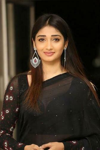Husharu Heroine Priya Vadlamani In Transparent Black Saree