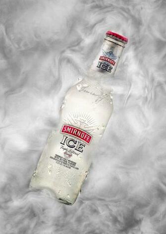 Smirnoff Ice Bottle In Smoky Background