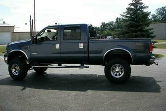 Jacked Up Ford Trucks With Stacks