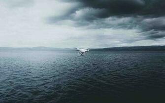 Quadrotor Drone On Ocean Wallpaper HD Stores