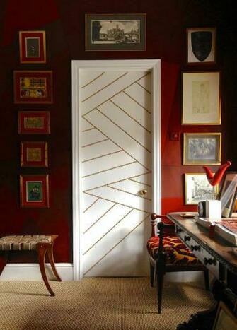 From Ashley Hicks Similar Brass Nail Head Detailing