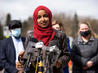 Ilhan Omar In A Red Hijab Wallpaper