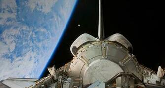 Space Shuttle Discovery Backdropped By Earth And The Moon Stocktrek
