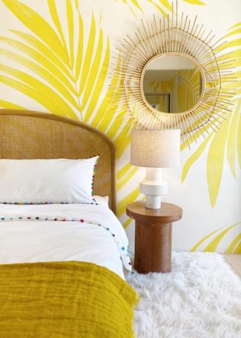 Bright Bedroom Features Tropical Wallpaper A Cane Headboard And
