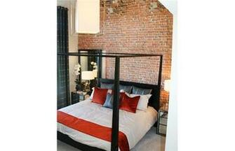 Andrea Cox For The Calgary Herald A High Ceiling And Brick Wallpaper