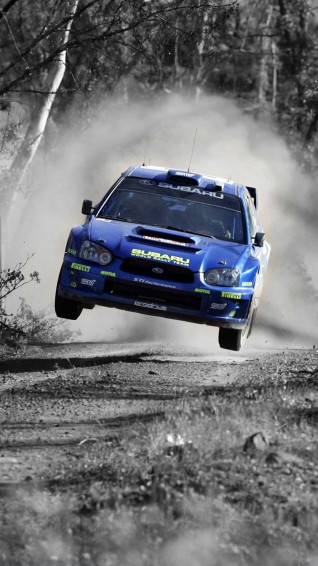 Subaru Rally Car Racing Off Wallpaper