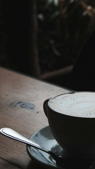 Black Ceramic Mug On Brown Wooden Table Photo Ballito Image