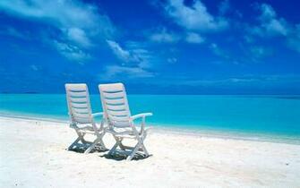 Two Beach Chairs On The Wallpaper