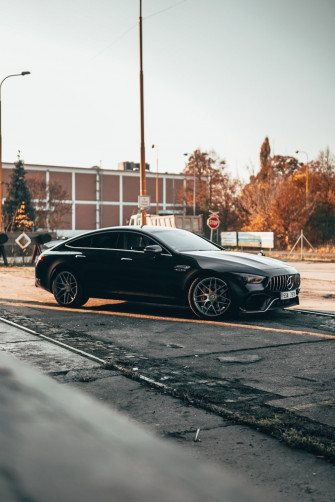 A Black Car Parked On The Side Of Road Photo Czech