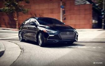 Hyundai Elantra Black Color Front Side On Road 4k UHD