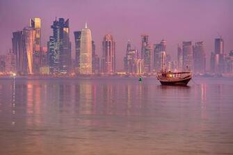Photo Dhow Boat And West Bay In Background From