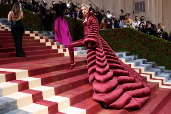 Models Posing In Their Met Gala Dresses Wallpaper