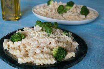 Pasta On Plate Blue Wooden Background Foto De Stock Thinkstock