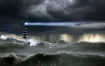 Lighthouse In The Storm Wallpaper