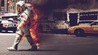 Burning Astronaut Desktop And Mobile Wallpaper Wallippo