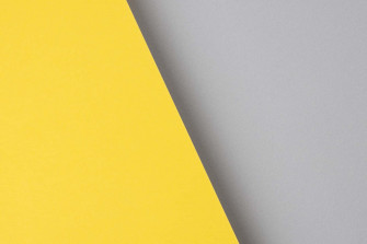 A Bright Gray And Yellow Wallpaper