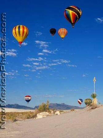 Hot Air Balloons Rise Into The Endless New Mexico Sky At