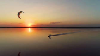 Calming Background On A Theme Of Kitesurfing At Sunset Stock Video