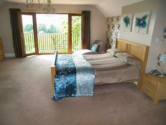 Photo Of Asian Blue Brown Metallic Balcony Bedroom Master With