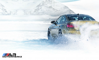 Bmw M4 In Snow Wallpaper