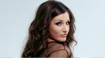 Lucy Pinder Looking Front Side Pose In Net Dress Wallpaper