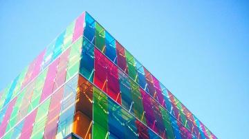 Big Architectural Building With Colourful Glass Walls