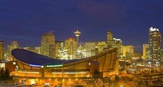 Calgary Tower And The City Skyline In Background At Dusk