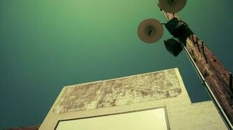 Street Lighting Pole Next To Brick Wall Wallpaper Pictures