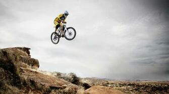 Mountain Biking Bicycle Off Road A Big Jump From Knoll