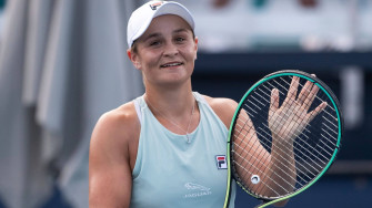 Champion Ashleigh Barty In Action Wallpaper