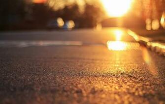 Close Up Land Asphalt Sun Rays Bokeh Blur Background Wallpaper