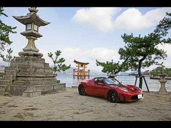 Red Tesla Roadster In Japan Front And Side Angle Desktop Wallpaper