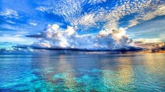 Blue Sea And Clouds Wallpaper Background