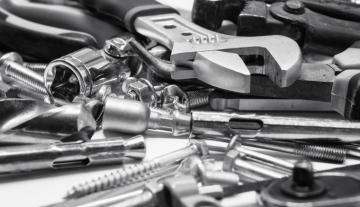Working Metal Tools Of Silver Color On The Background Overland