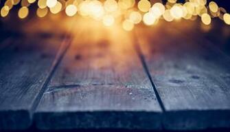 Christmas Lights On Empty Table Background Defocused Blue Wood