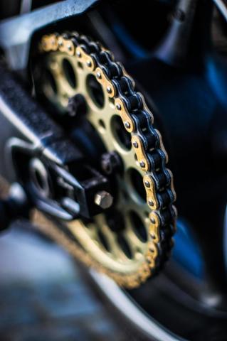 Selective Focus Photography Of Gold Sprocket Photo Image On