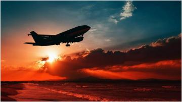 Plane Flying Over Sea 4k Wallpaper