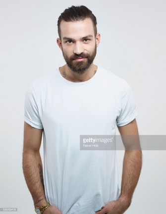 Portrait Of Young Man Against White Background Smiling Wallpaper
