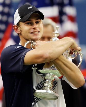 Andy Roddick Holding The Us Open Tennis Trophy Wallpaper