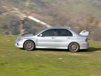 Mitsubishi Lancer Evolution Ix Side Speed Wallpaper