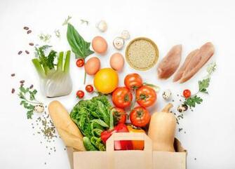 Full Paper Bag Of Different Health Food On White Background Fit