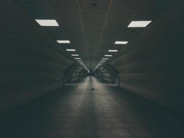 Dark Tunnel Road With Turned On Ceiling Lamps Photo Grey