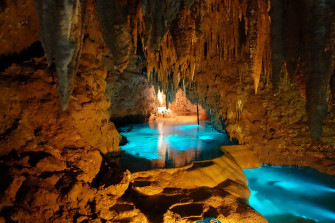 Illuminated Caves Wallpaper Image Photos Picture