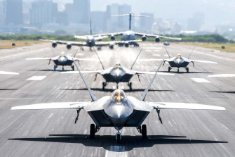 A Group Of Military Jets On Runway Wallpaper