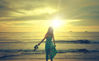 Walking Sad Girl On Beach Wallpaper