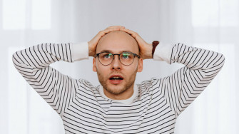 Bald Man With A Disbelief Reaction Wallpaper