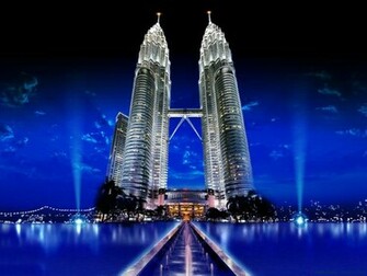 The Petronas Towers Malay Menara Also Known As