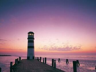 Beautiful Austrian Lighthouse In Sunset Wallpaper